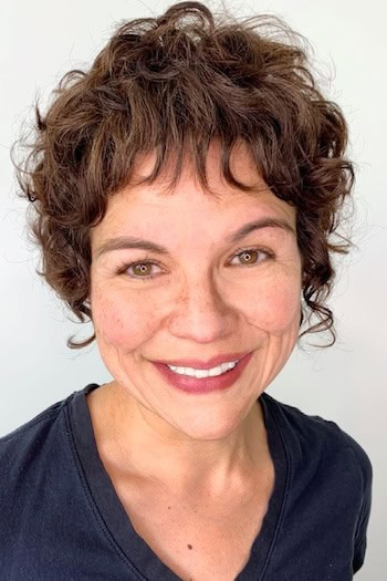 Curly Short Shag with Baby Bangs Hairstyle