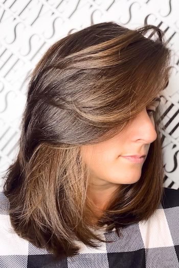 Voluminous Side-Swept Layers Haircut
