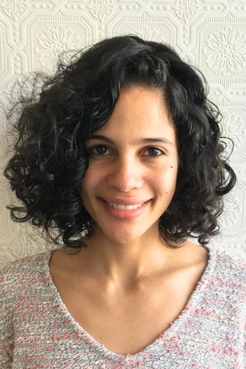 Medium-Length Curly Bob With Side Part Haircut