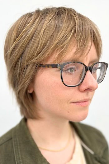 Cropped Tapered Layers With Bangs Haircut