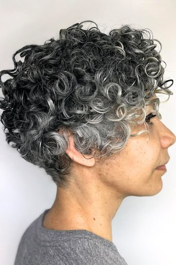 Tight Curly Salt and Pepper Pixie Haircut