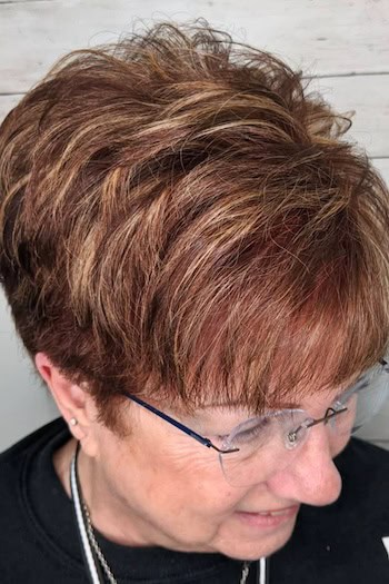 Volumized Layered Pixie With Highlights Hairstyle
