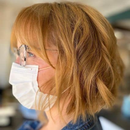 Blunt Wavy Bob With Bangs Haircut