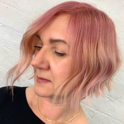 Short Soft Wavy Bob With Pink Tones Haircut