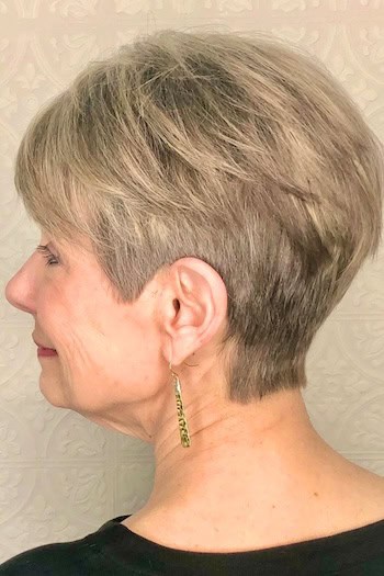 Classic tapered pixie for thick hair, side view.