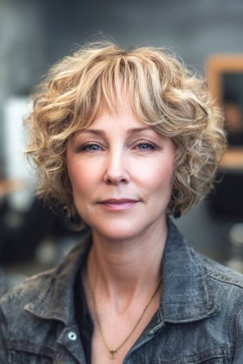 Layered Curly Bob with Textured Bangs