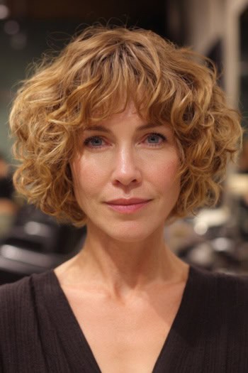 Rounded Layered Curly Bob with Bangs Haircut