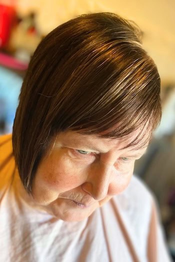 Sleek Asymmetrical Bob with Bangs Haircut