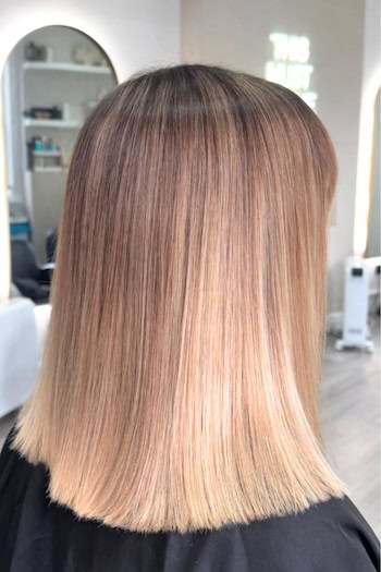 Blonde Balayage Long Bob Hairstyle, back view.