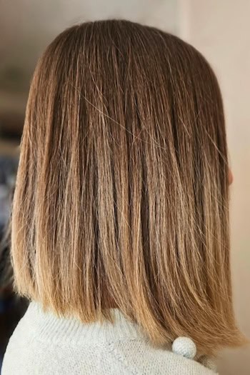 Bronde Subtle Balayage Lob with Texture Hairstyle, side view.