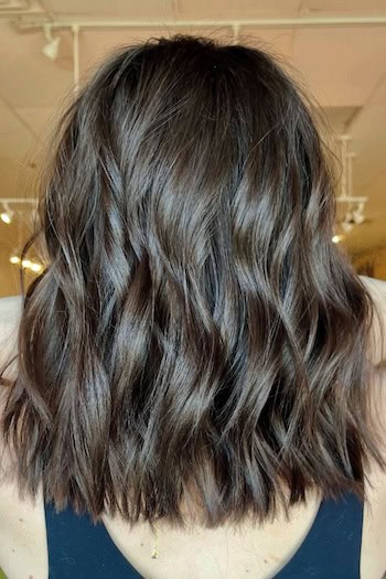 Chocolate Brown Wavy Long Bob Hairstyle, back view.
