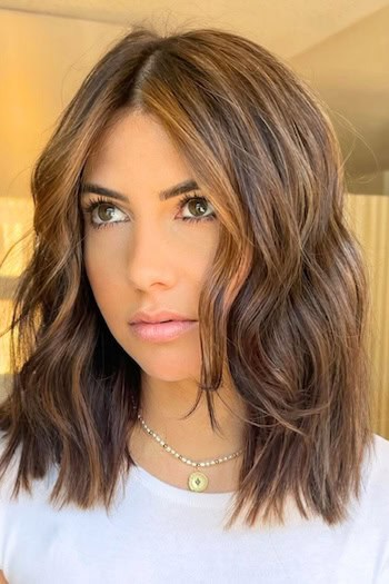 Brunette Face-Framing Wavy Lob Hairstyle