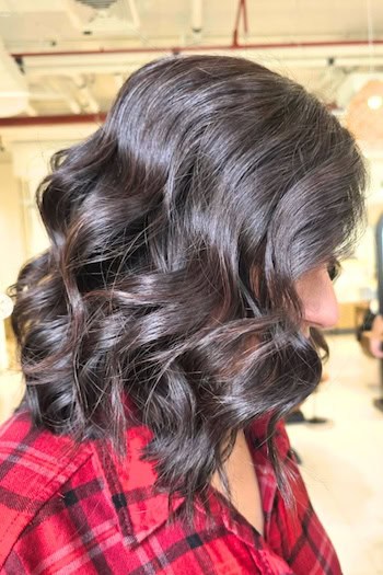 Chocolate Wavy Lob Hairstyle, side view.