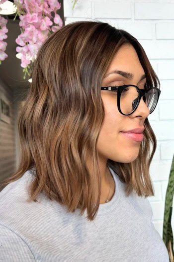 Caramel Balayage Wavy Long Bob for Fine Hair Hairstyle, side view.