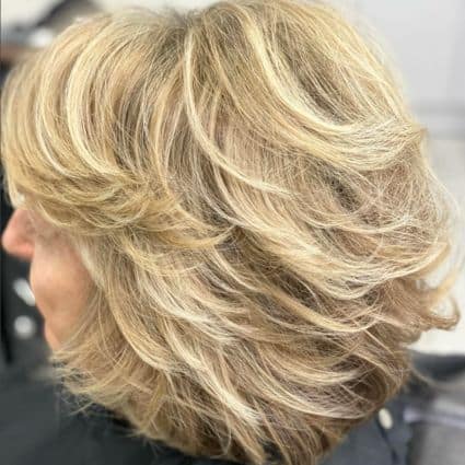 Voluminous Feathered Layered Bob Hairstyle