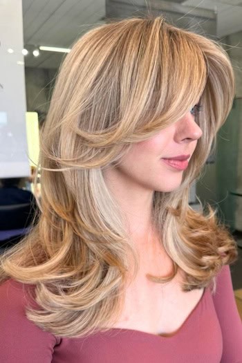 Medium Feathered Layers with Side Bangs Haircut