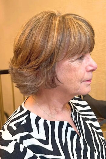 Cropped Feathered Layered Bob With Bangs Hairstyle