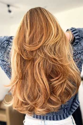 Long Voluminous Hair with Layers Haircut