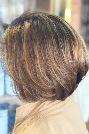 Brunette Layered Bob With Highlights Hairstyle