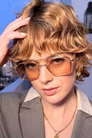 Short Curly Shag With Bangs Hairstyle