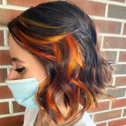 Wavy Bob With Orange Highlights Hairstyle