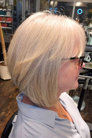 Wispy Layered Angled Bob with Bangs Haircut