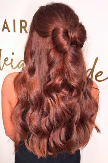 Long Holiday Waves With Hair Bow Hairstyle, from back.