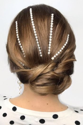 Christmas Low Bun With Pearl Strands Hairstyle, from back.