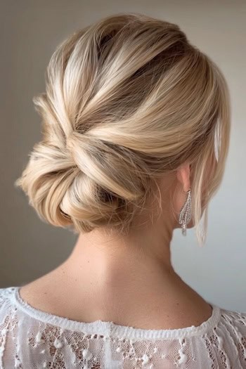 Low Bun With A Twist Hairstyle