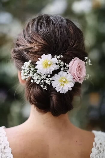 Low Twisted Updo with Flowers Hairstyle