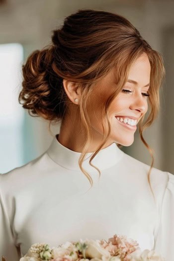 Low Updo with Face-Framing Pieces Hairstyle