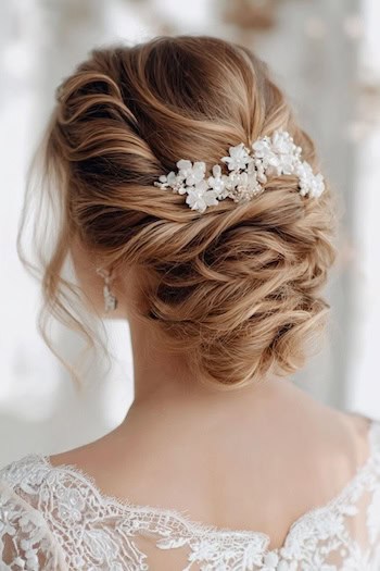 Romantic Low Twisted Chignon with Hairpiece Hairstyle