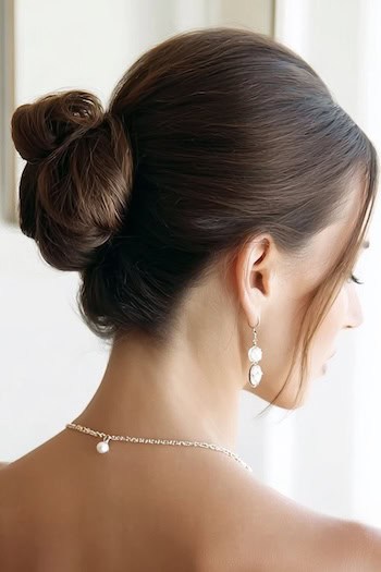 Elegant Bun with Face-Framing Pieces Hairstyle