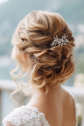 Loose Textured Updo with Pearl and Rhinestone Accessory Hairstyle