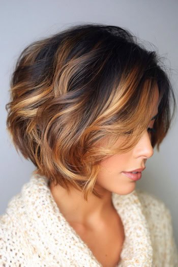 Wavy Bob with Warm Caramel Highlights Hair Color