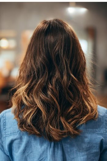 Tousled Highlighted Waves Haircut
