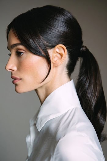 Low Ponytail with Side Bangs Hairstyle