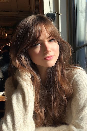 Long Natural Waves with Curtain Bangs Hairstyle