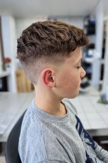 Wavy Textured Crop with Low Skin Fade Boys Haircut