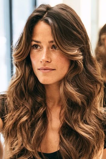 Voluminous Waves with Curtain Bangs Hairstyle