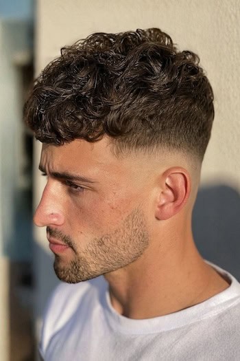 Curly Fringe with Low Skin Fade Haircut